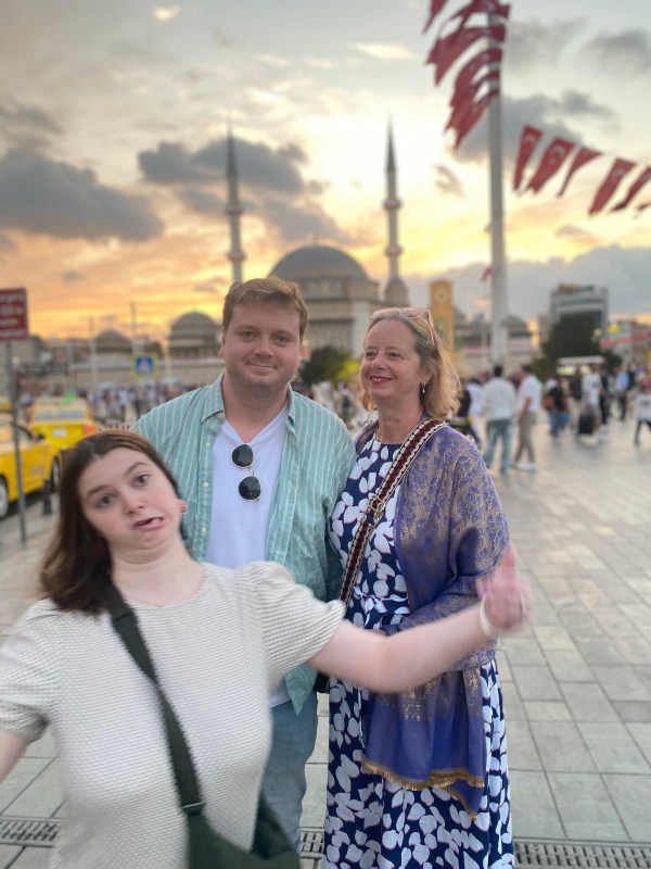 Emily photobombing a family photograph in front of Taksim Mosque in Istanbul