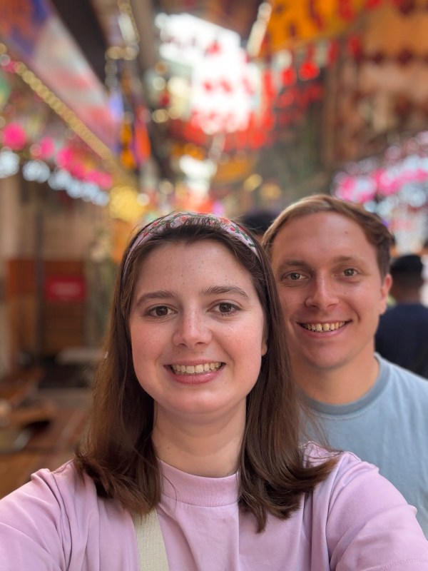 Emily and Bryson on Hanoi Train Street